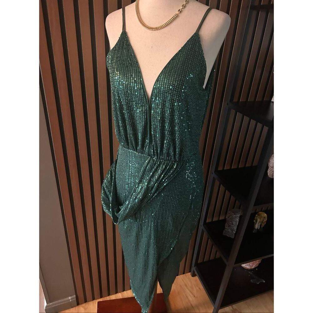 Prettylittlething sleeveless cocktail mini dress features a plunging V-neckline